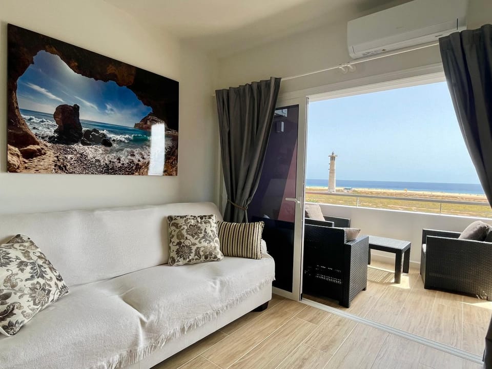 View (from property/room), Balcony/Terrace, Living room, Seating area, Sea view