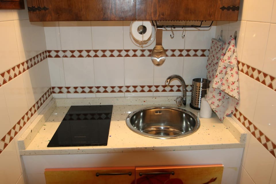 Kitchen or kitchenette, stove