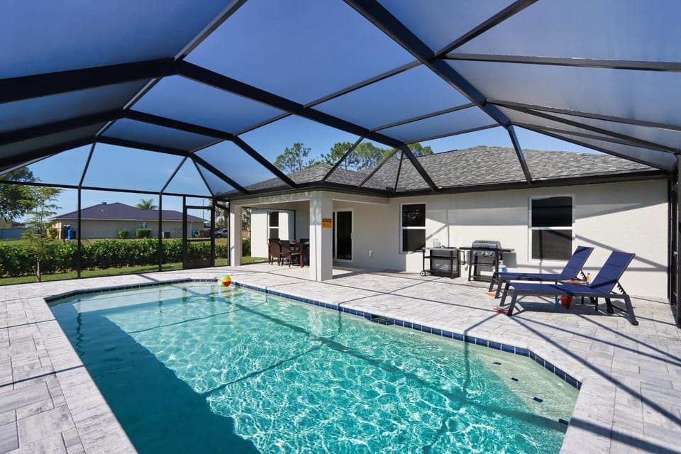 New Build Pool Home With Modern Design and Open Floor Plan in Cape Coral House in North Fort Myers