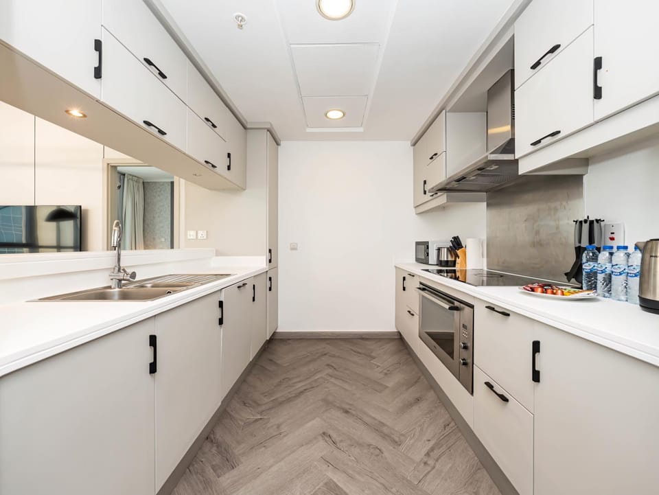 Kitchen or kitchenette, oven, stove