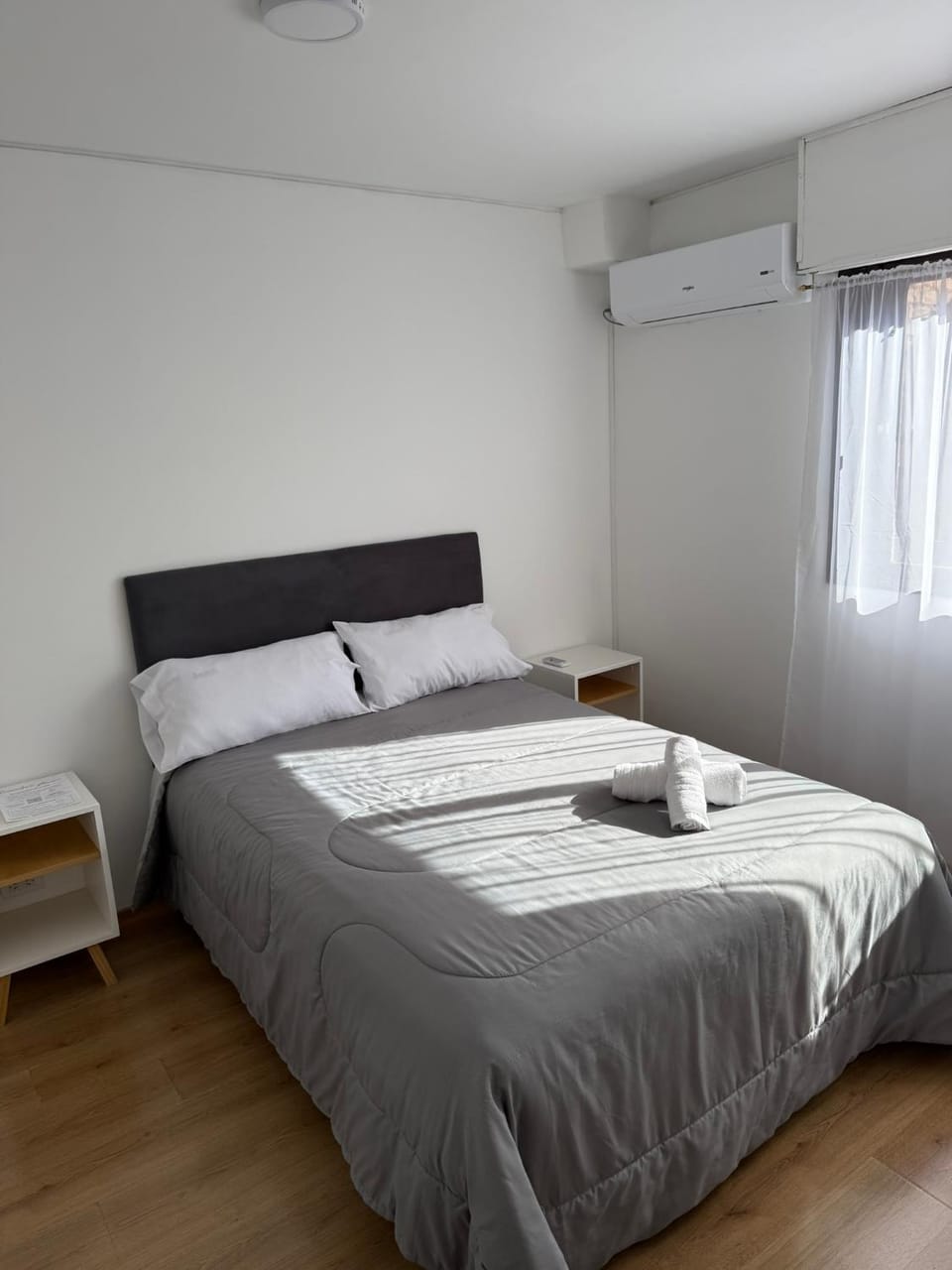 Bed, Photo of the whole room, Bedroom, towels, air conditioner