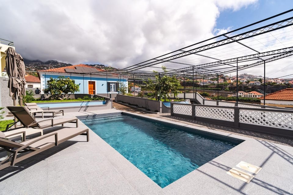 Property building, Living room, Swimming pool
