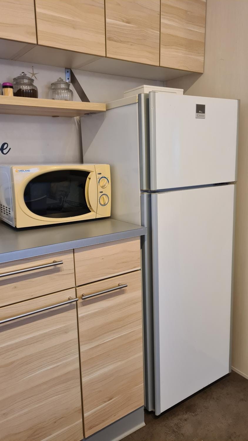 Kitchen or kitchenette, microwave