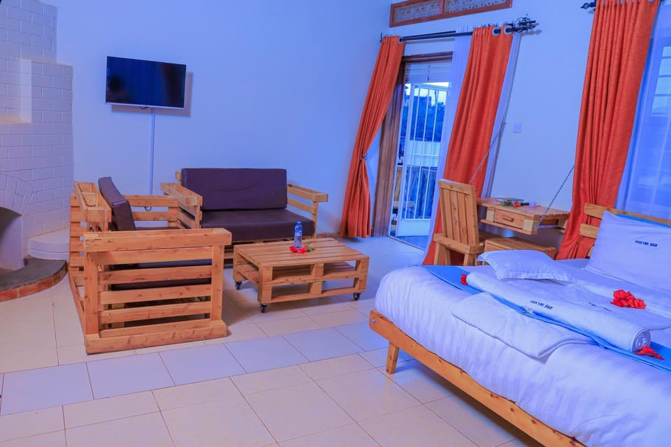 Communal lounge/ TV room, TV and multimedia, Living room, Seating area, Dining area, towels
