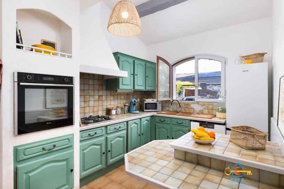Kitchen or kitchenette, oven, stove, toaster