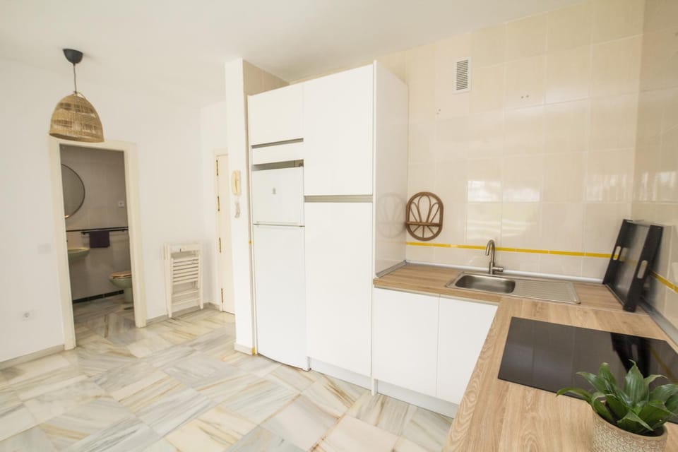 Kitchen or kitchenette, oven, stove