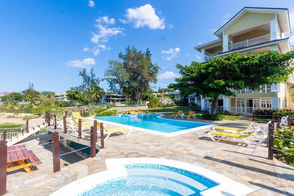 Property building, Pool view, Swimming pool, sunbed