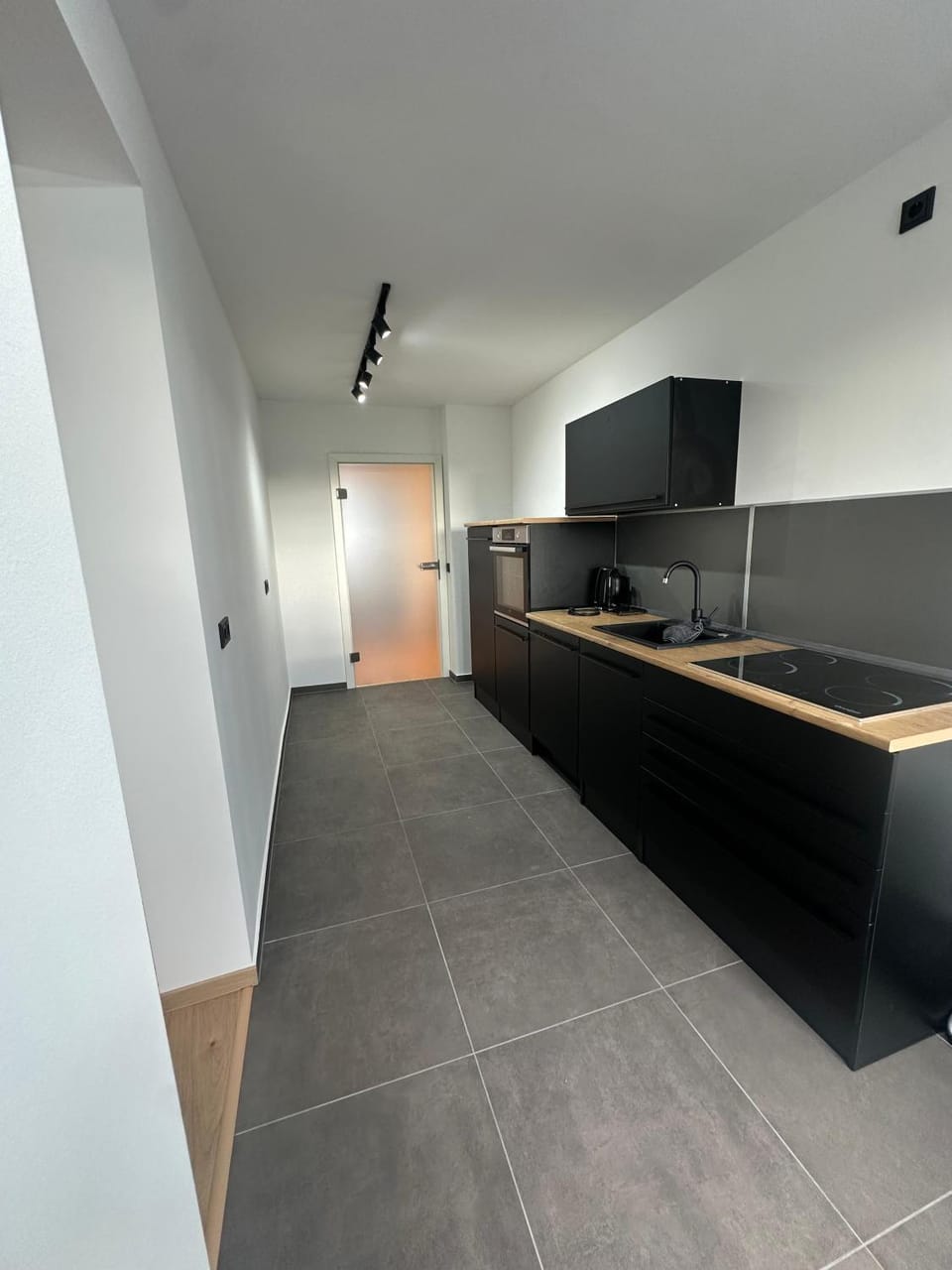 Kitchen or kitchenette, oven