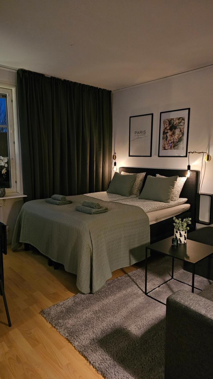 Bed, Living room, Seating area, Bedroom