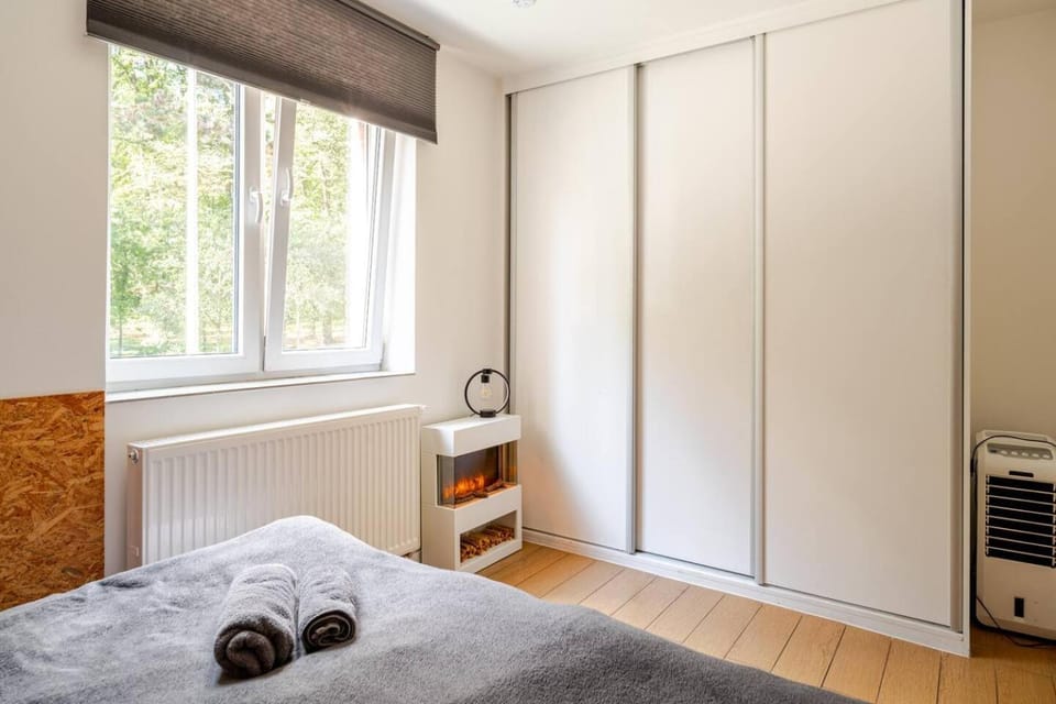 Bed, Bedroom, towels, wardrobe, air conditioner