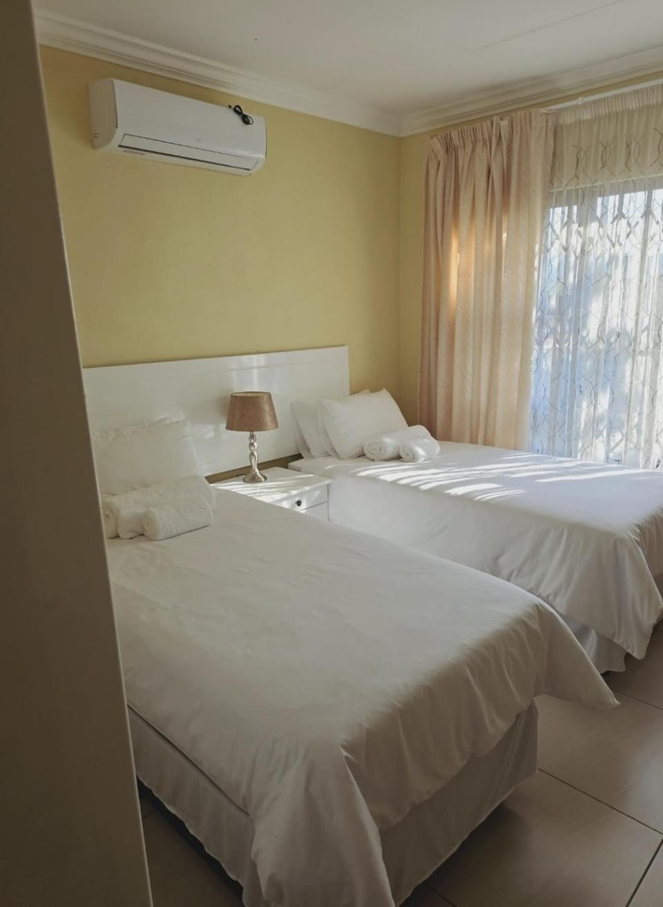Bed, Photo of the whole room, Bedroom, towels, air conditioner