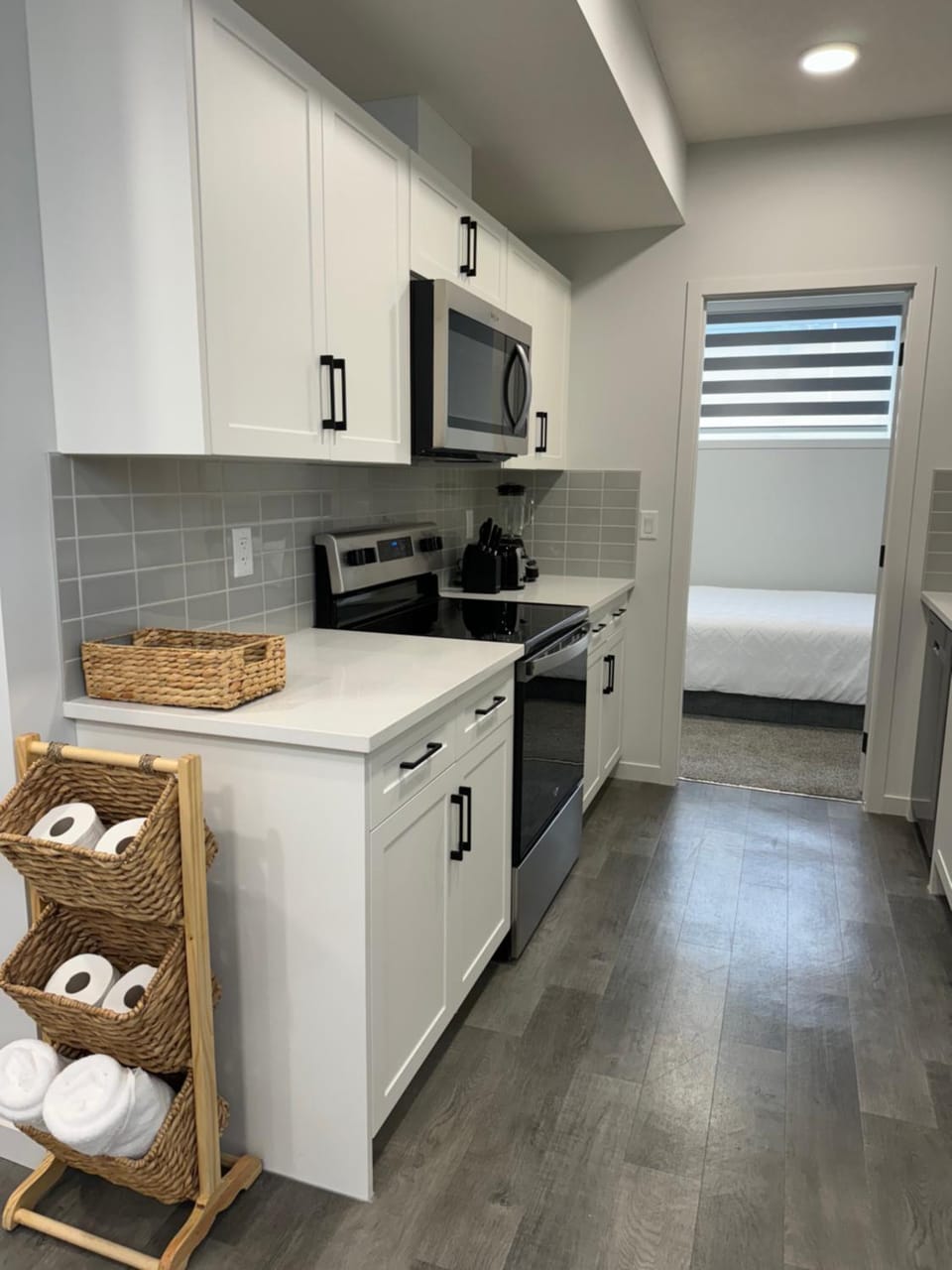 Kitchen or kitchenette, dishwasher, oven, stove, toaster