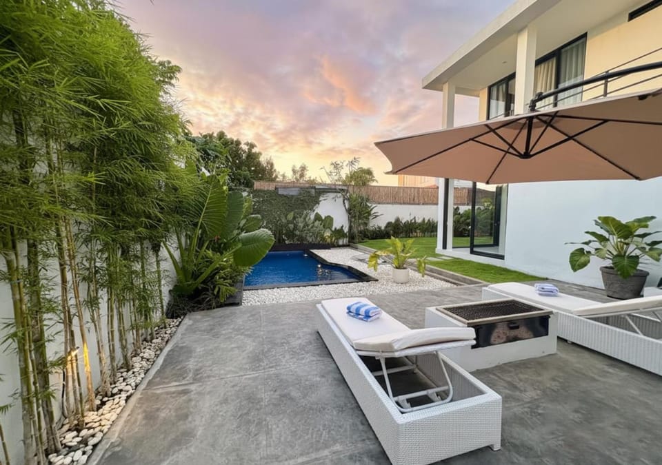 Property building, BBQ facilities, View (from property/room), Seating area, Garden view, Pool view, Swimming pool