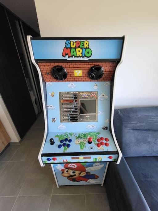 Rez-de-jardin de Maison avec spa et borne d'arcade Apartment in Aurillac