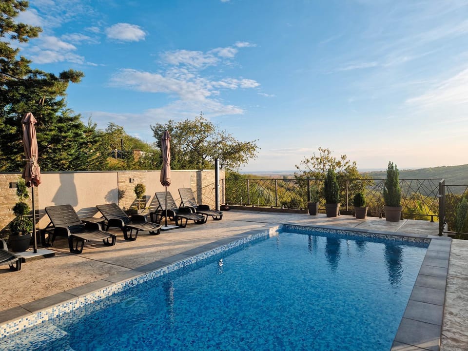 Patio, Day, Natural landscape, Pool view, Swimming pool