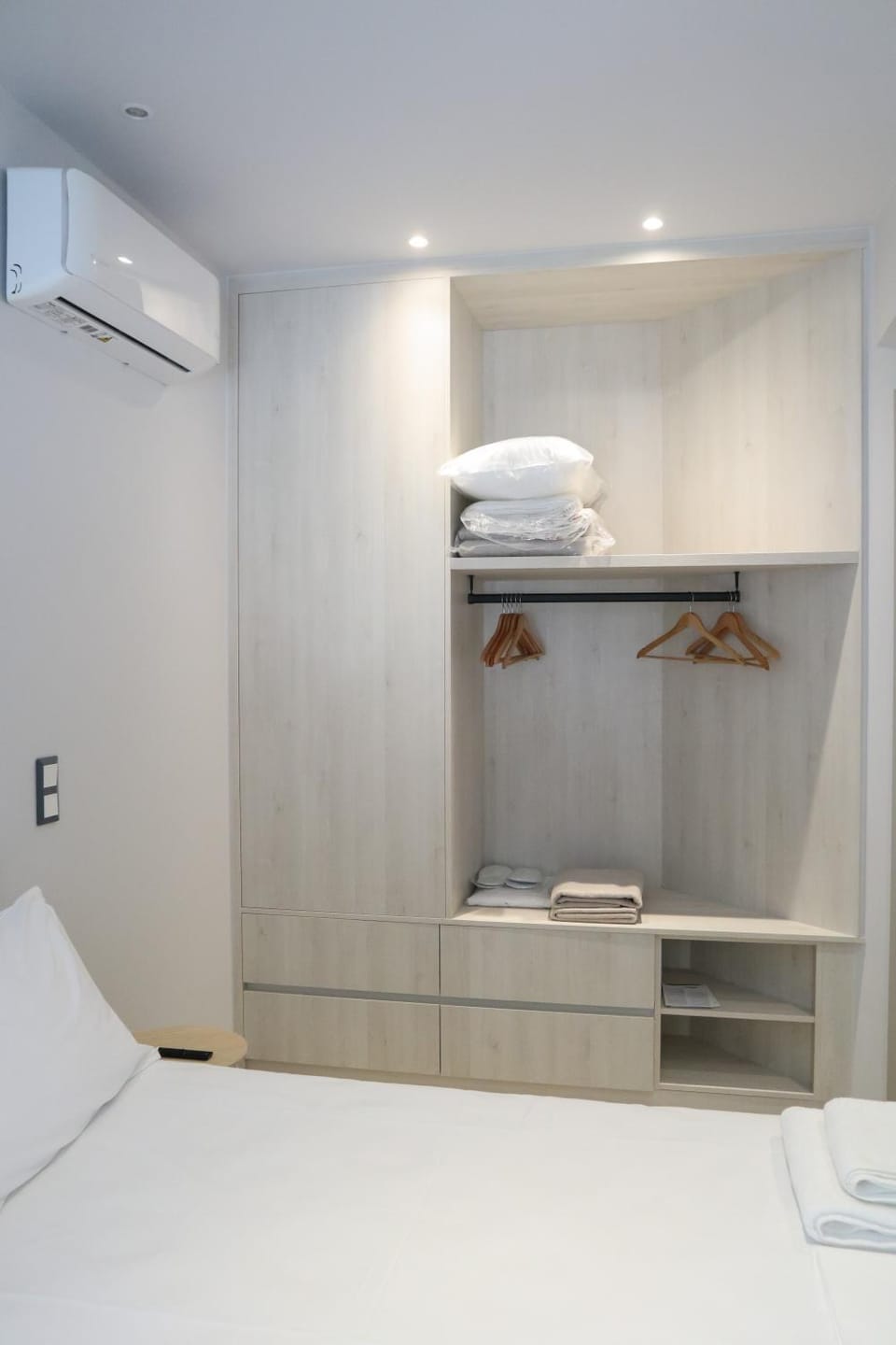 Photo of the whole room, Bedroom, towels, wardrobe, air conditioner