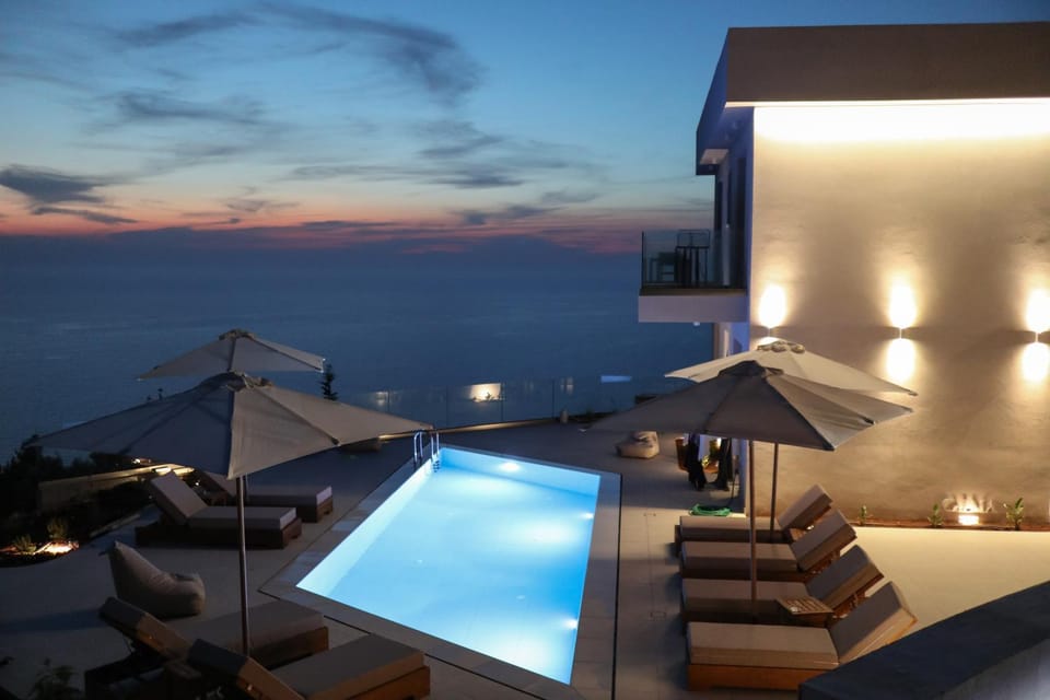 Property building, Night, Natural landscape, View (from property/room), Pool view, Sea view, Swimming pool, sunbed