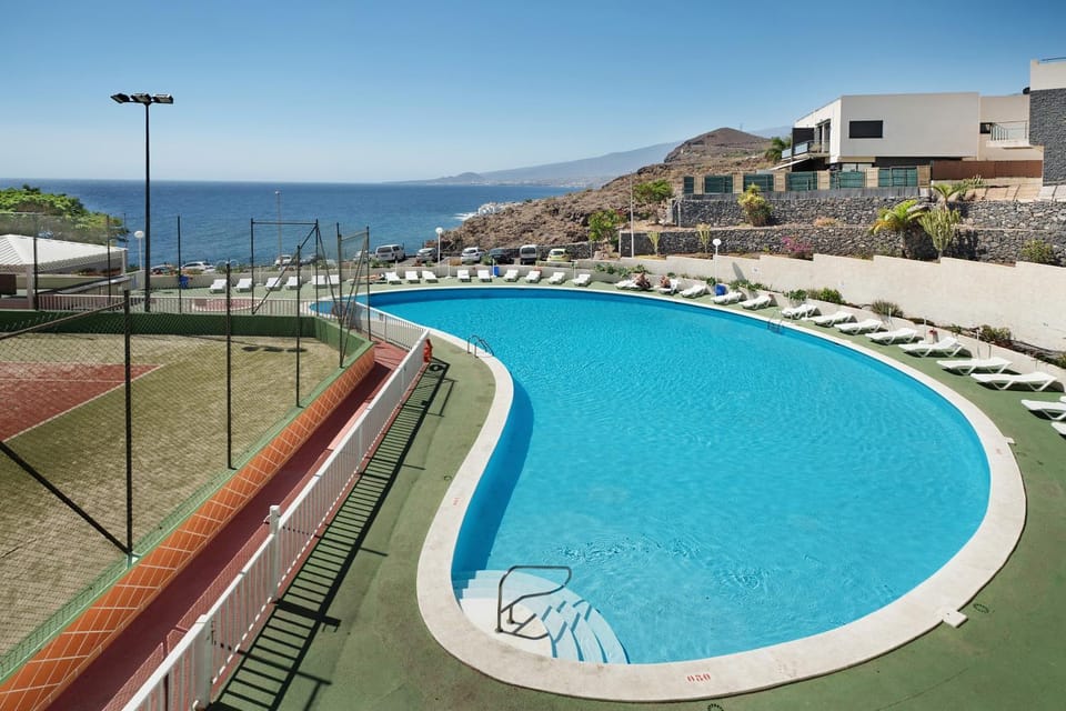 Property building, Living room, Swimming pool