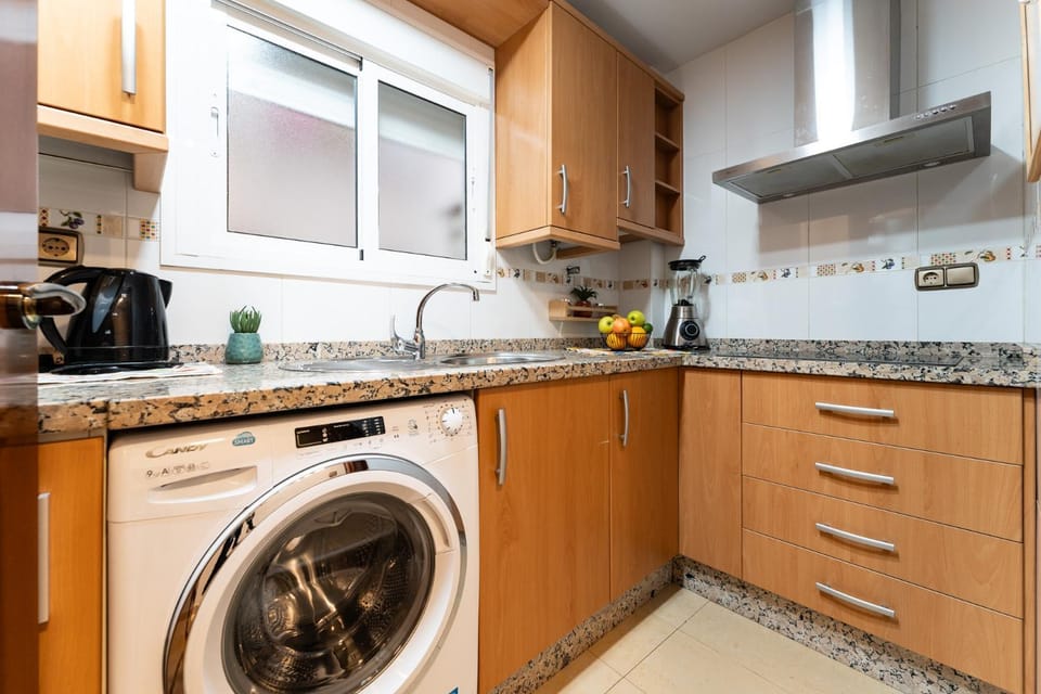Kitchen or kitchenette, washing machine