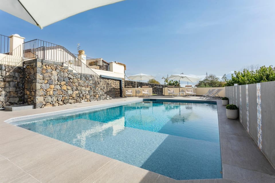 Property building, Living room, Swimming pool