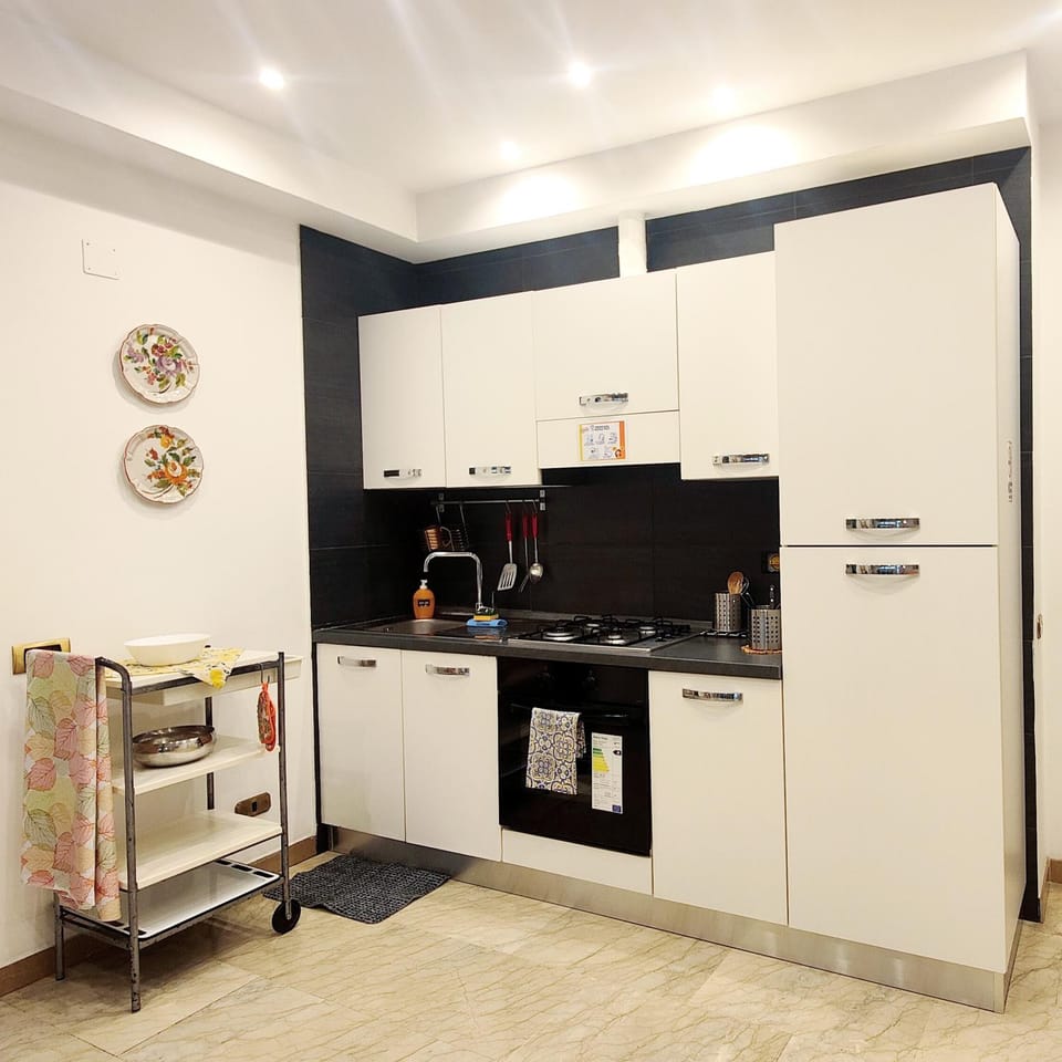 Kitchen or kitchenette, oven, stove