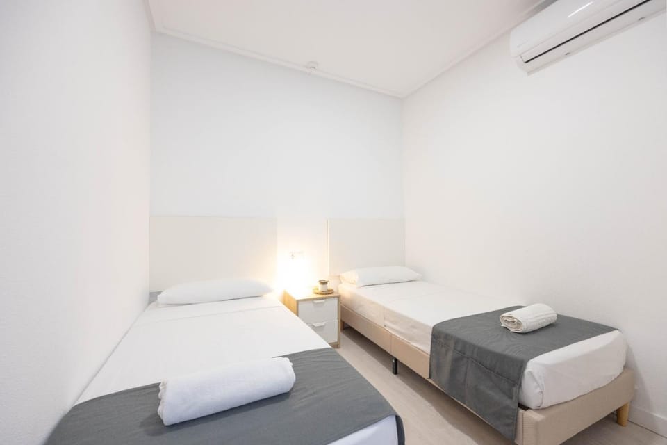 Bed, Photo of the whole room, Bedroom, towels, air conditioner