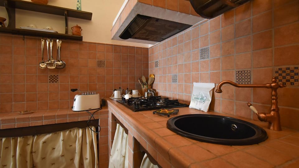 Kitchen or kitchenette, stove