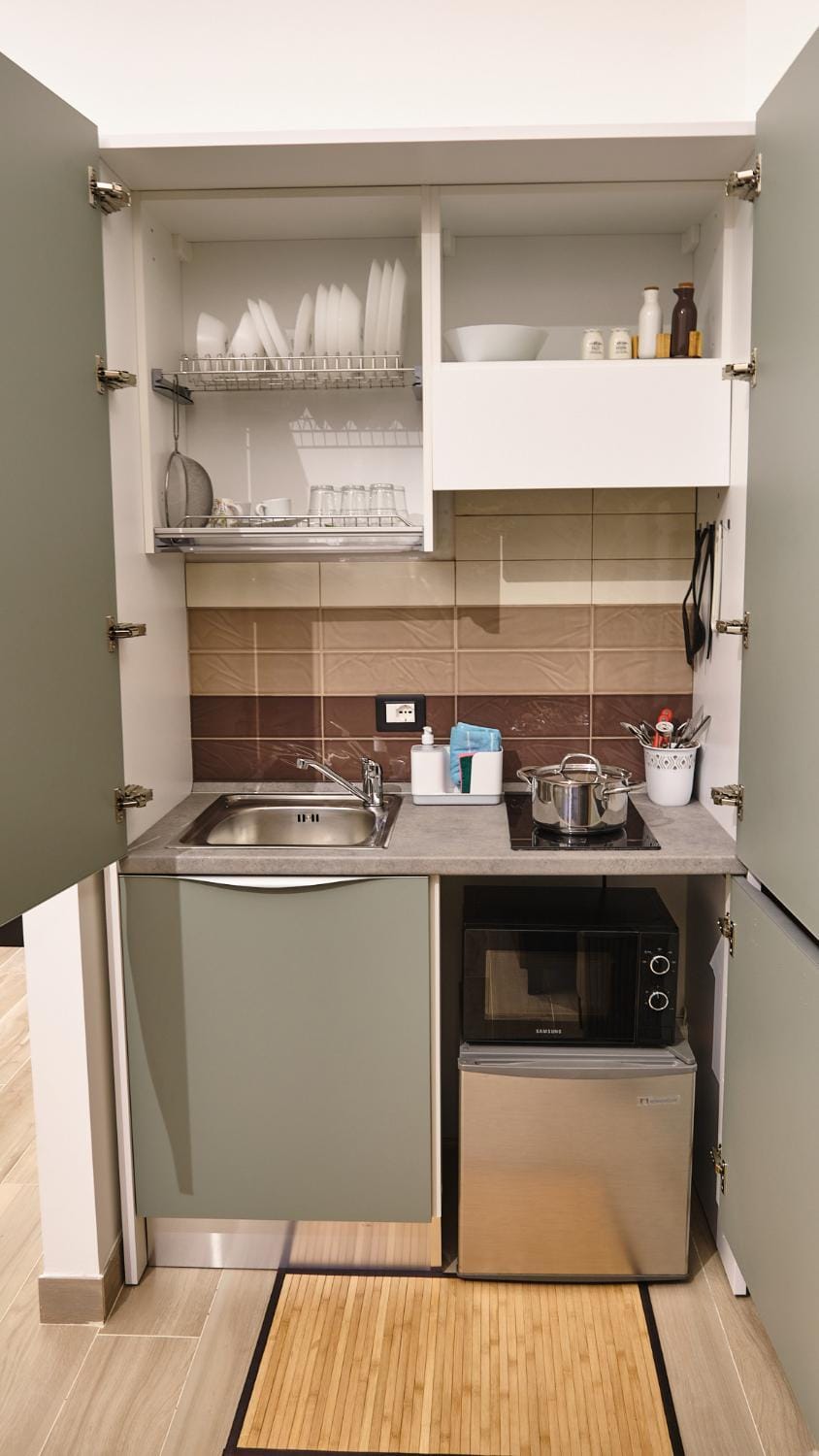 Kitchen or kitchenette, stove