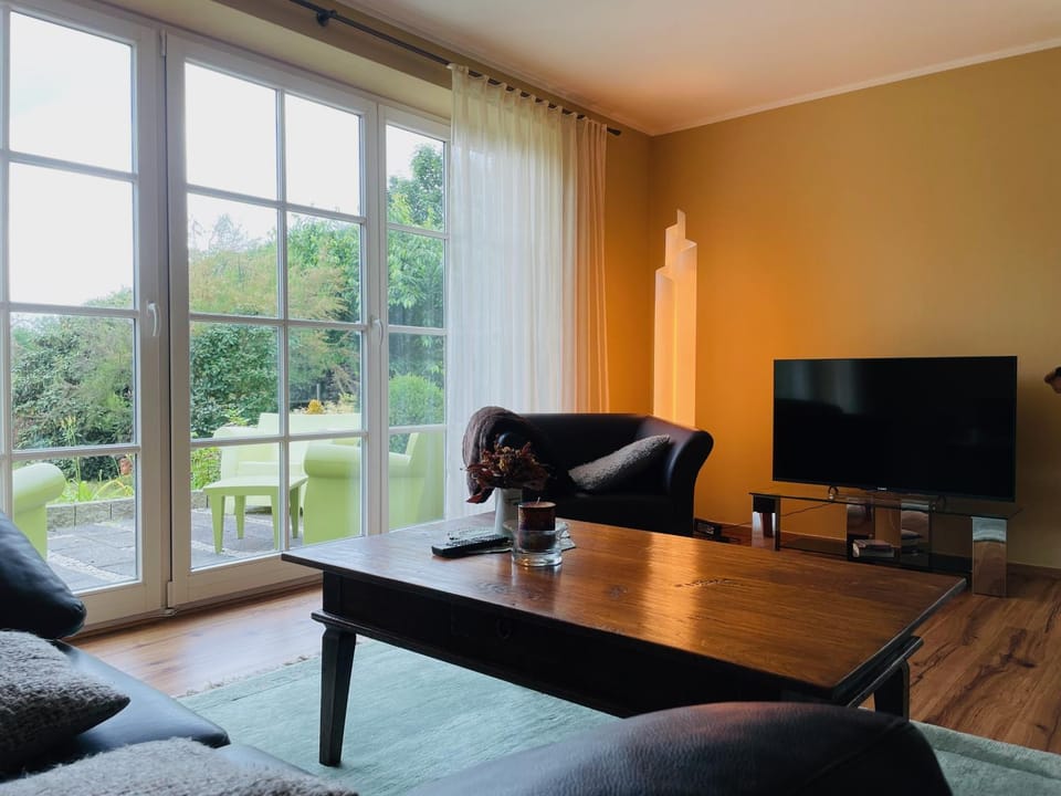 Living room, Seating area, Garden view