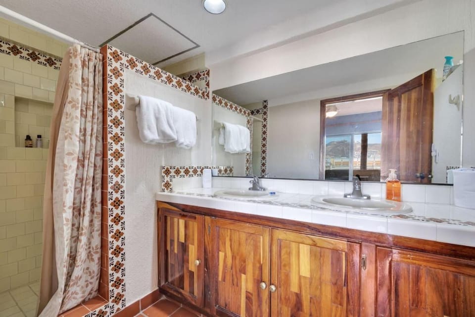 2 minute walk to Medano Beach House in Cabo San Lucas