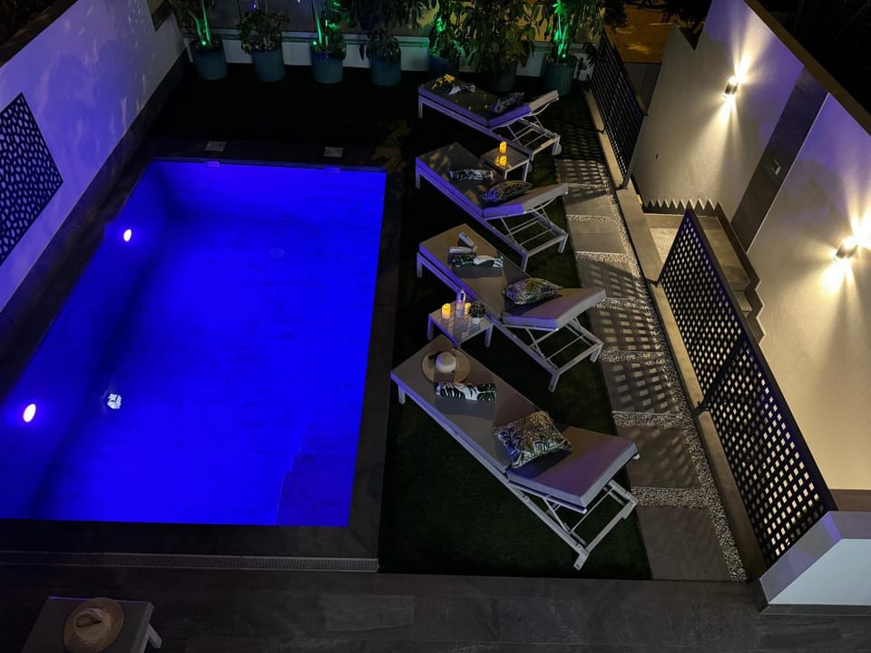 Night, Pool view, Swimming pool, sunbed