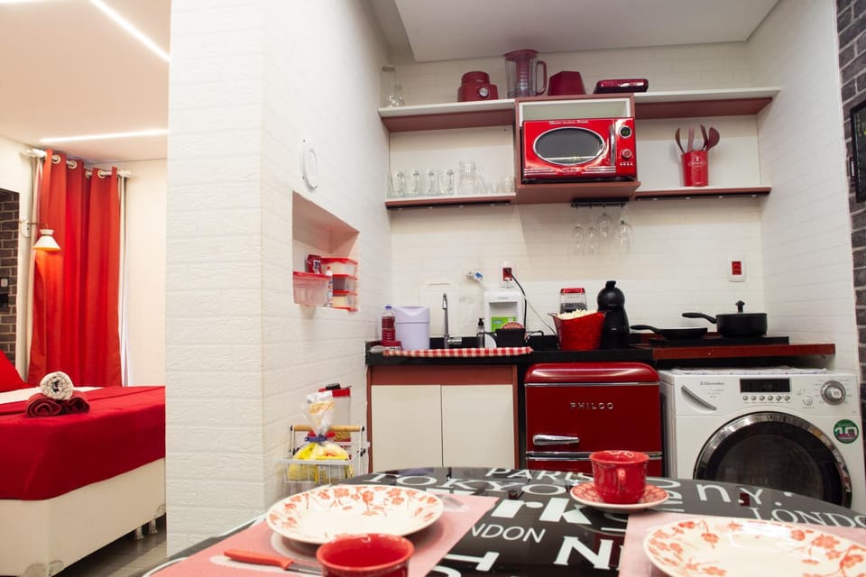 Kitchen or kitchenette, Living room, Seating area, Dining area, minibar, stove, toaster, washing machine, dryer