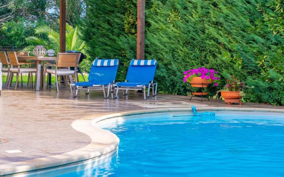 Property building, Living room, Swimming pool
