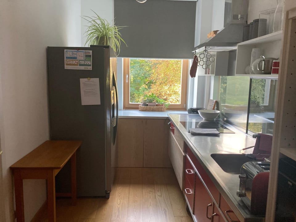 Kitchen or kitchenette, dishwasher, oven, stove, toaster