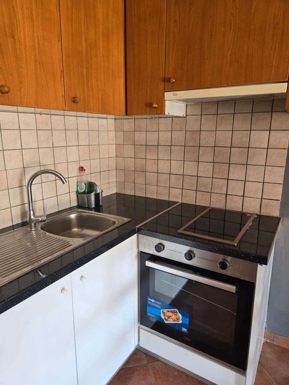 Kitchen or kitchenette, stove