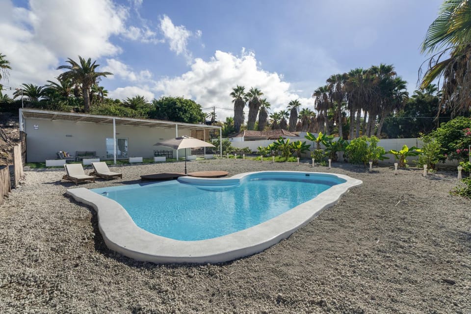 Property building, Living room, Swimming pool