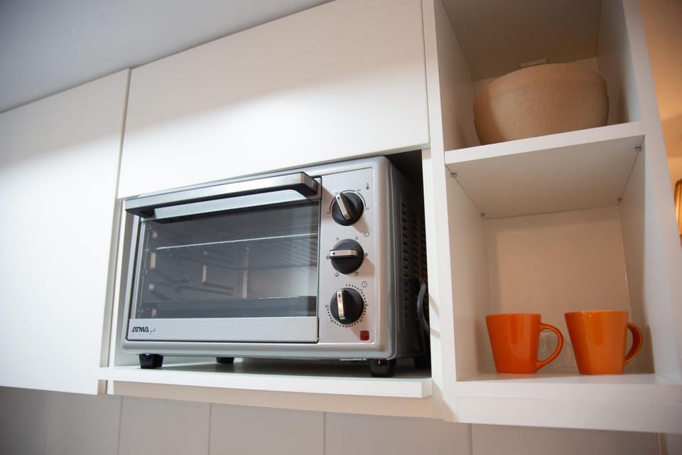 Kitchen or kitchenette, oven