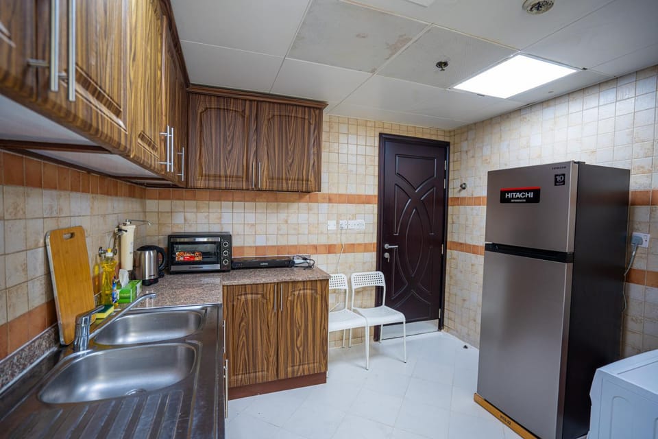 Kitchen or kitchenette, oven, stove