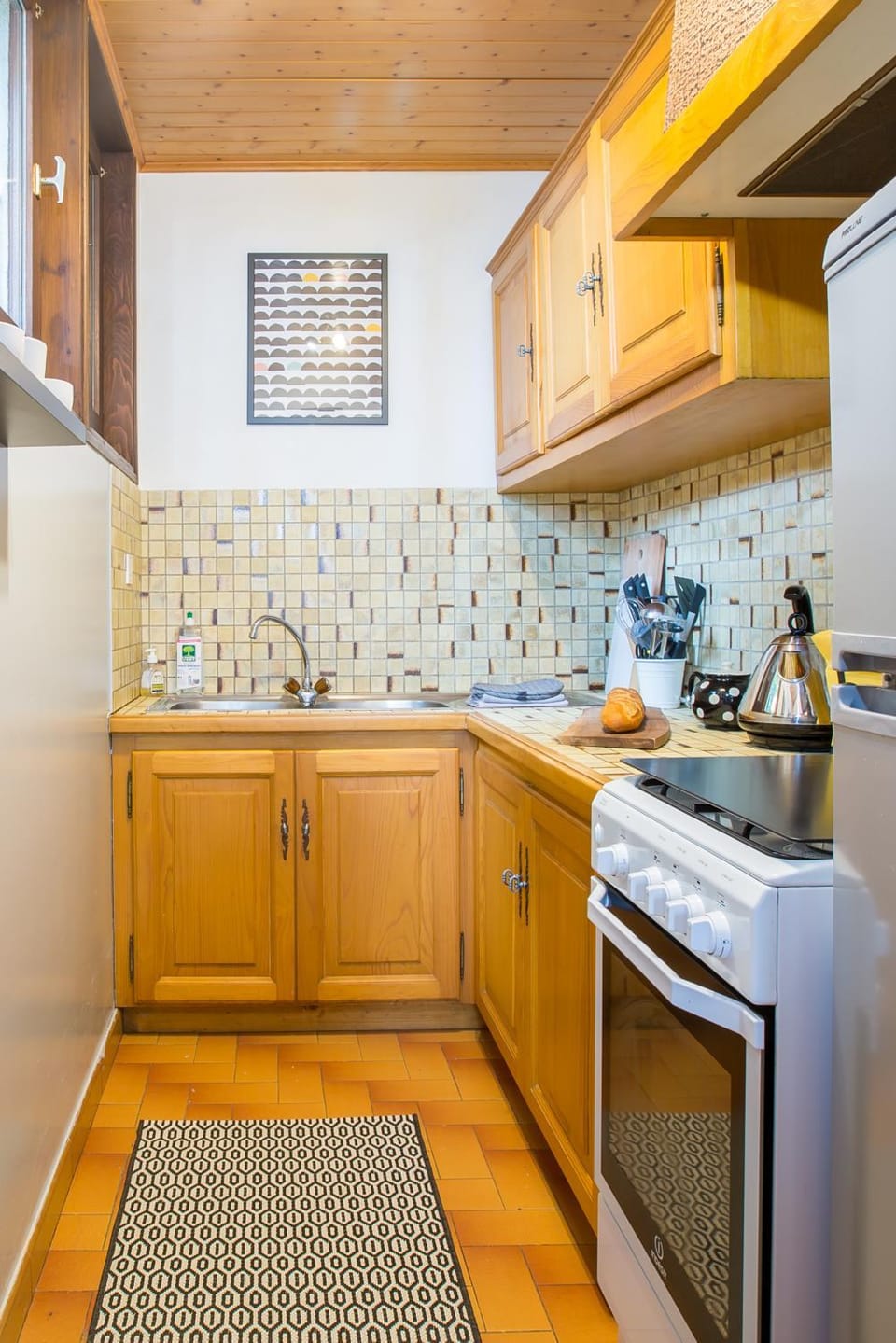 Kitchen or kitchenette, oven, stove, toaster