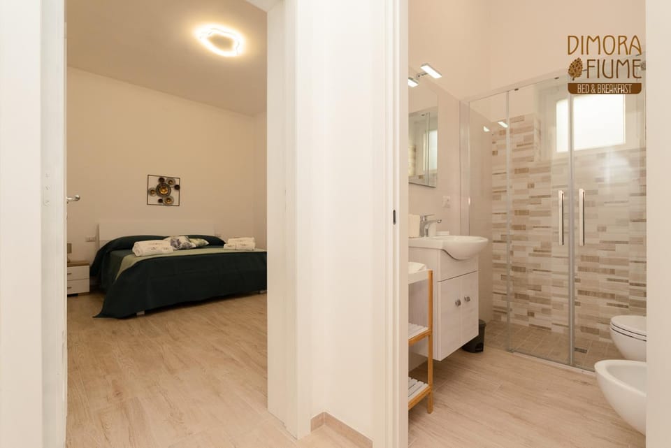 Shower, Toilet, Bed, Bathroom, Photo of the whole room, Bedroom, bidet, towels