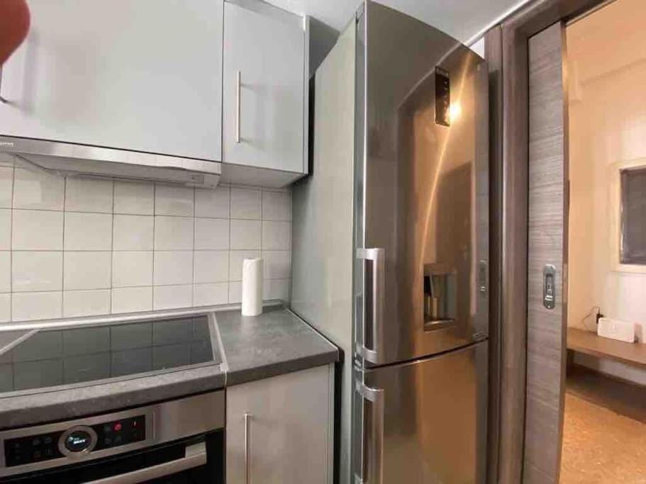 Kitchen or kitchenette, oven, stove