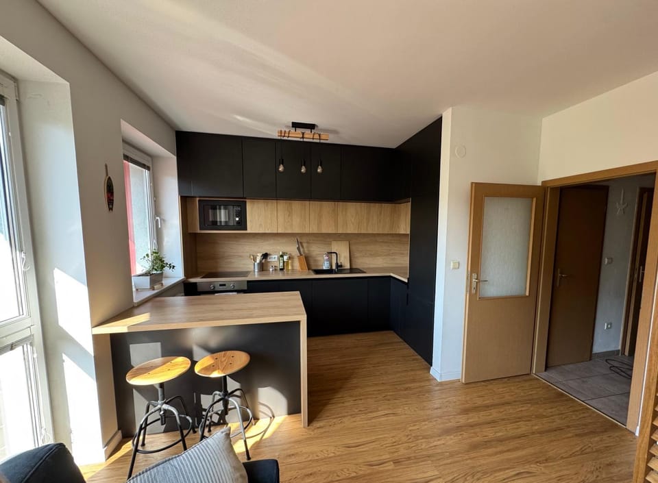 Kitchen or kitchenette, microwave, oven, stove, kitchen