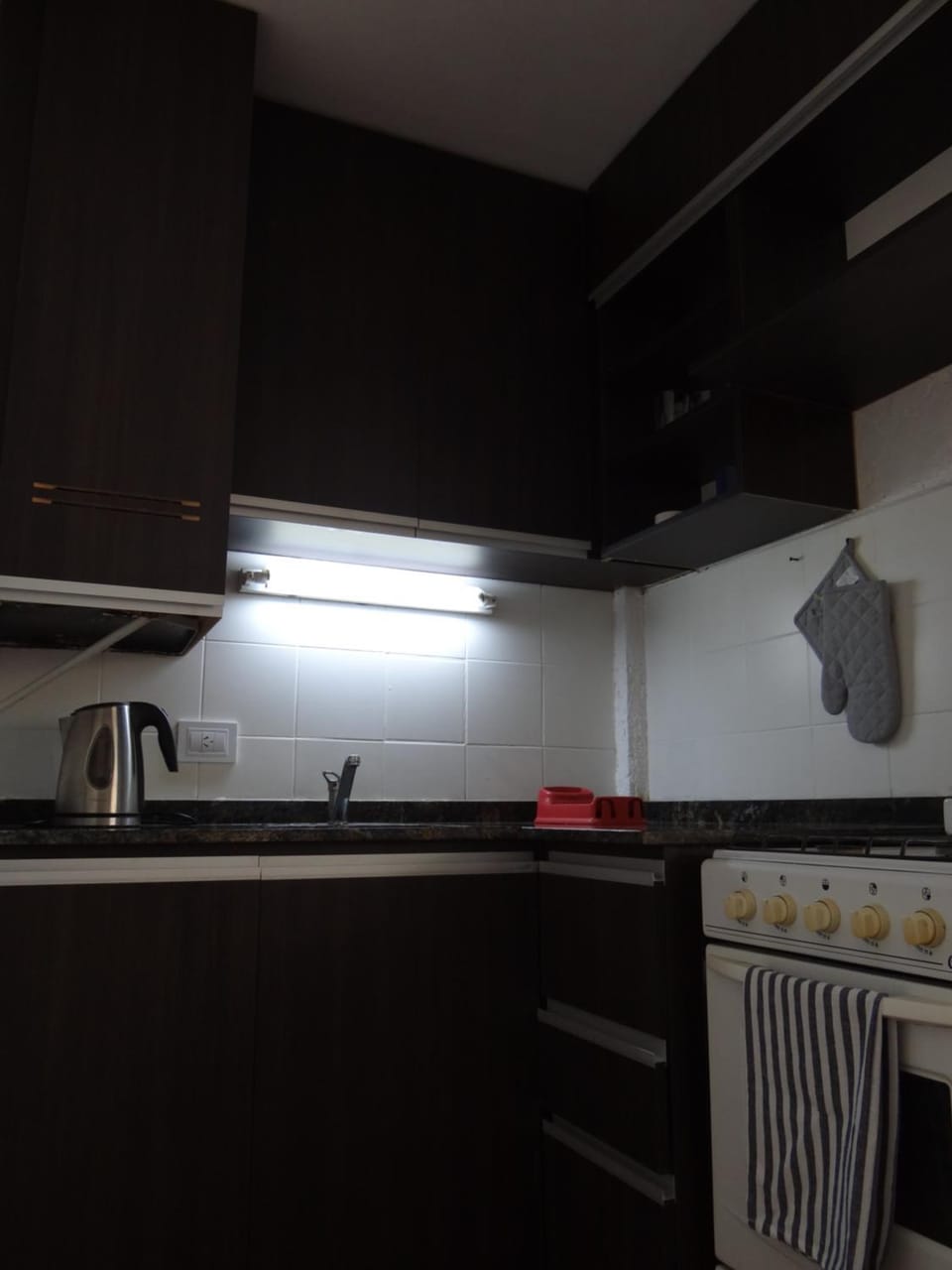 Kitchen or kitchenette, stove
