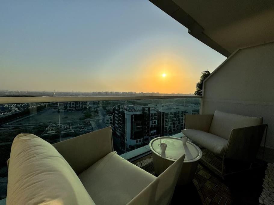 Natural landscape, View (from property/room), Balcony/Terrace, Seating area, Sunset