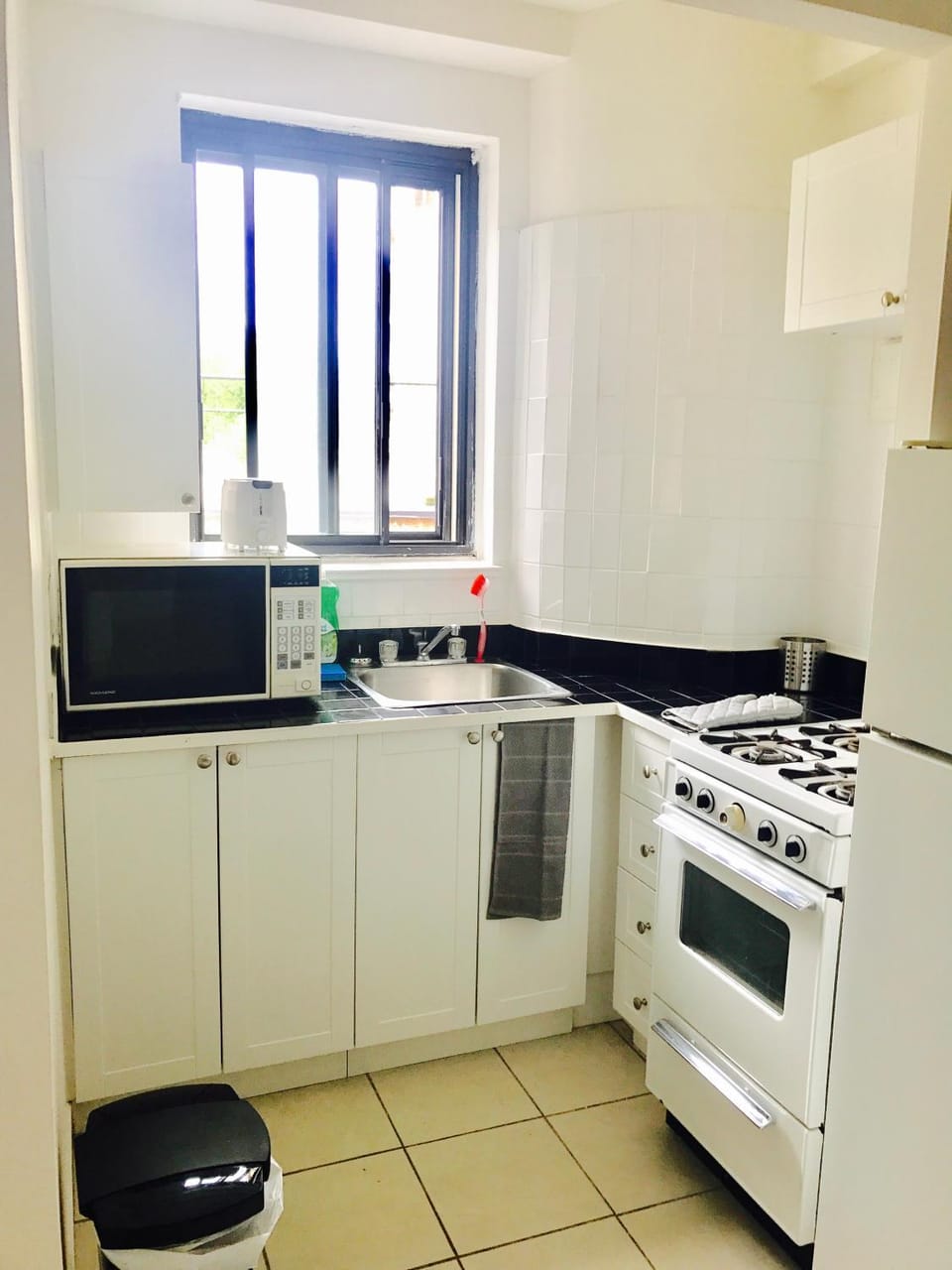 Kitchen or kitchenette, oven, stove, toaster