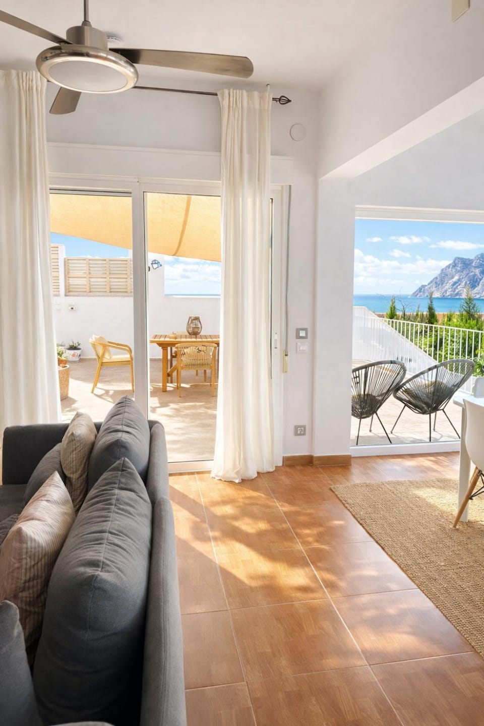 Natural landscape, Living room, Seating area, Dining area, Mountain view, Sea view