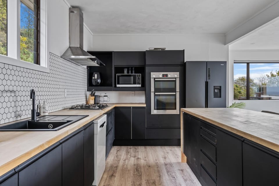 Kitchen or kitchenette, dishwasher, oven, stove, toaster