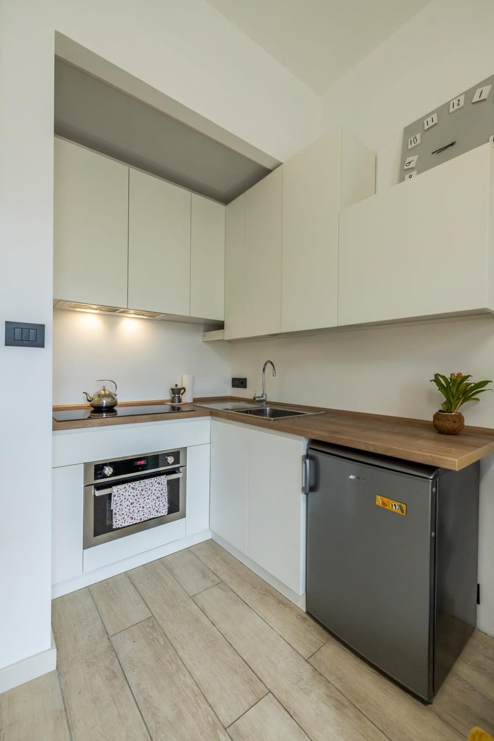 Kitchen or kitchenette, oven, stove