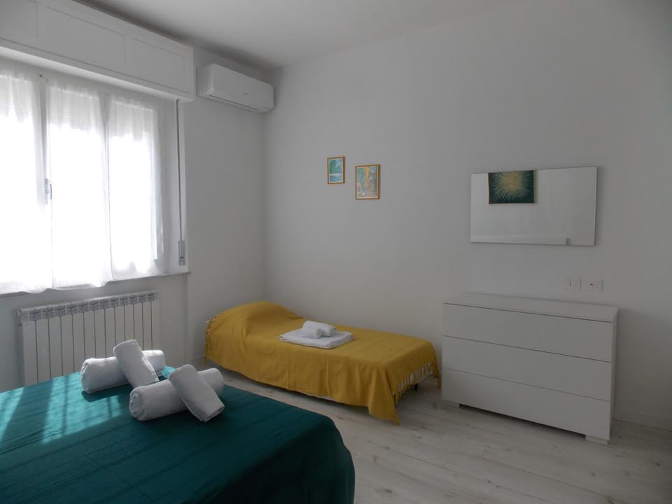 Bed, Photo of the whole room, Bedroom, towels, air conditioner