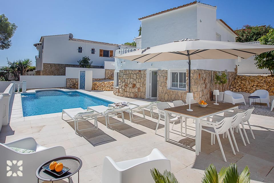 Property building, Patio, Day, Living room, Seating area, Dining area, Pool view, Swimming pool, sunbed